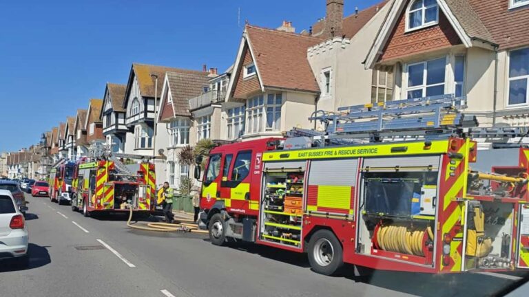 Fire engines with hoses deployed on Grosvenor Crescent at 11:30am on April 24