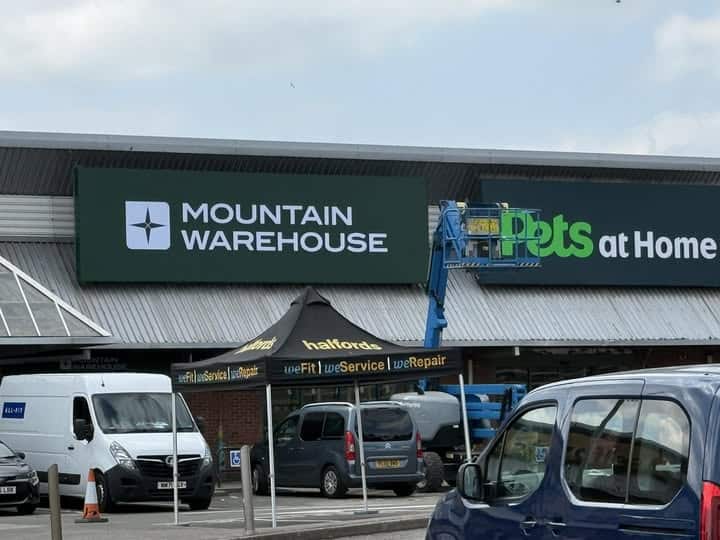 Mountain Warehouse sign installed at former Poundland store in Ravenside Retail Park Bexhill
