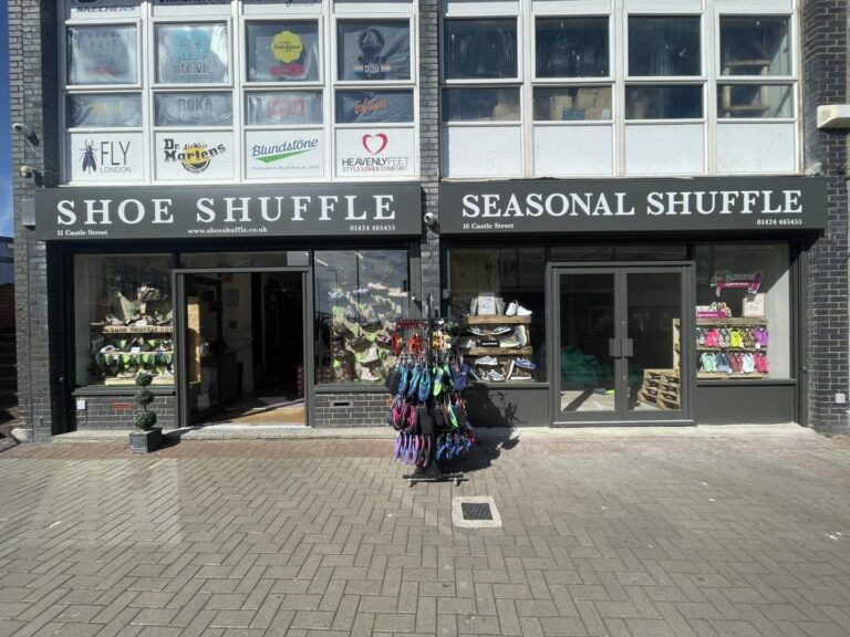 Shoe Shuffle shop front on Castle Street in Hastings with neighbouring unit being taken over