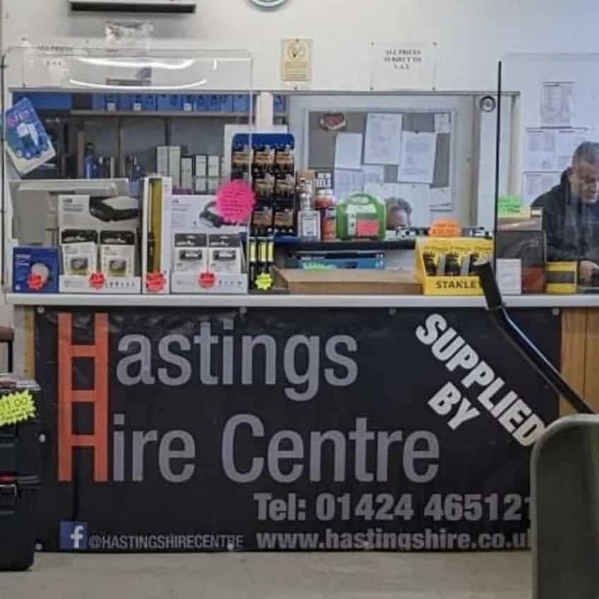 Trade counter inside Hastings Hire Centre with tool hire equipment, accessories and customer service desk
